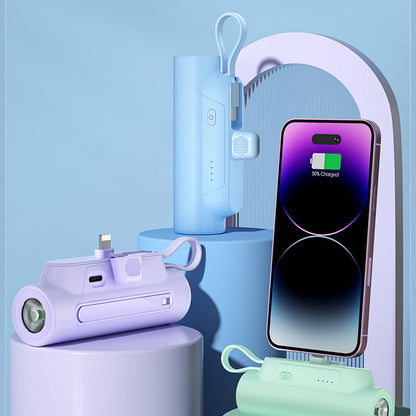 Multifunktionel bærbar oplader med kabel