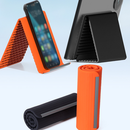 📱 Elastyczny silikonowy uchwyt na telefon, tablet i laptop – 50% ZNIŻKI! OFERTA LIMITOWANA!🚗✨Miękki, elastyczny i uniwersalny – Stabilny, antypoślizgowy i łatwy w montażu. Trzyma urządzenie pewnie w każdej pozycji! 🔄