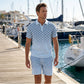 👕 Męski zestaw – koszulka z kołnierzykiem + spodenki – 50% ZNIŻKI!🌊 OFERTA LIMITOWANA!Geometryczny nadruk, oddychająca tkanina, nowoczesny i spójny look – idealny na lato, plażę i codzienne wyjścia.Lekki, wygodny i stylowy.💪✨