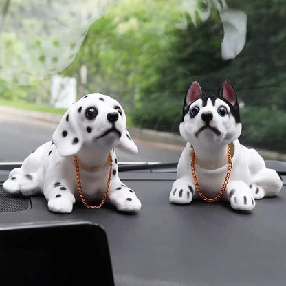 🐶 Dekoracja na deskę z pieskiem – 50% ZNIŻKI! OFERTA LIMITOWANA!🐾 Uroczy piesek kiwa głową – umila każdą podróż i dodaje radości na długich trasach.✨ Łatwy montaż, pasuje do każdego auta. Wesoły towarzysz dla kierowcy i pasażerów! 🚗